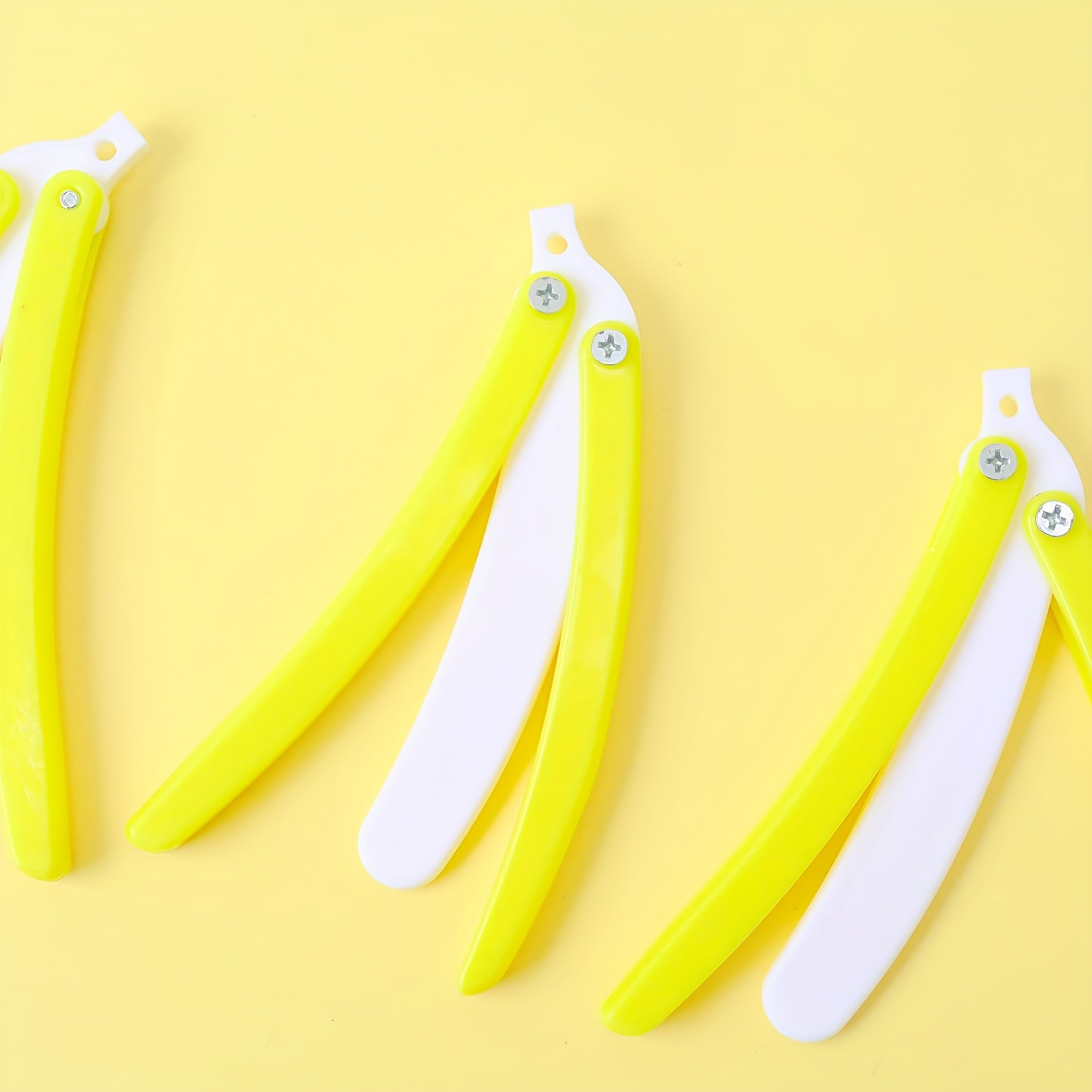 Radish Butterfly Knife - Non-Sharp Safe Folding Prop with Yellow & White Handle, Lightweight Anime Weapon for Halloween Costumes, Cosplay, Themed Parties - Durable Plastic Construction - Ideal Gift for Anime Fans & Halloween